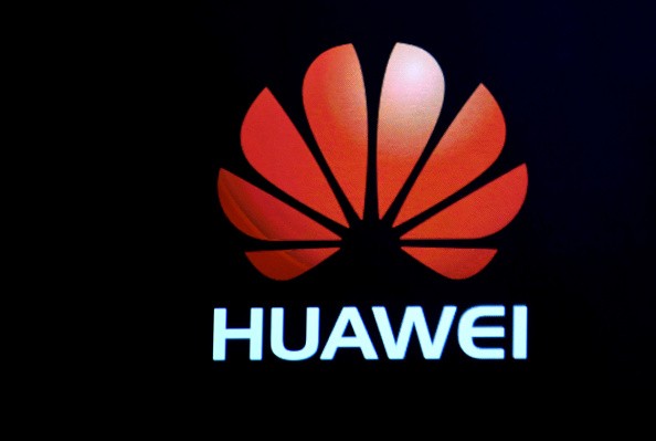 Huawei logo is shown on a screen during a keynote address by CEO of Huawei Consumer Business Group Richard Yu at CES 2017 at The Venetian Las Vegas on January 5, 2017 in Las Vegas, Nevada.
