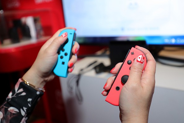Nintendo of America, A guest enjoys playing Mario Kart 8 Deluxe on the groundbreaking new Nintendo Switch at a special preview event in New York on Jan. 13, 2017.