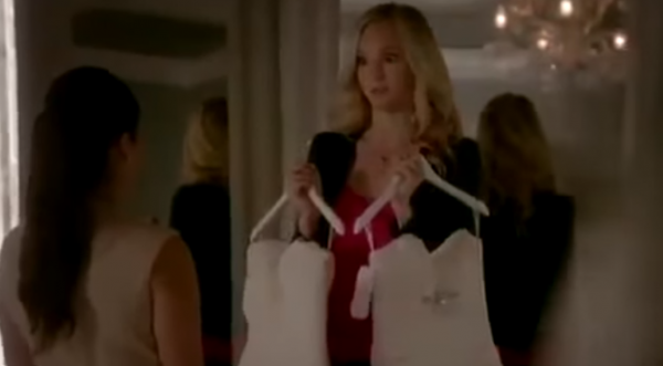 Caroline (Candice King) chooses the perfect bridal dress for her wedding in "The Vampire Diaries" Season 8.