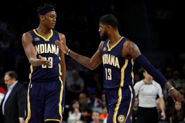 Indiana Pacers players Myles Turner (L) and Paul George