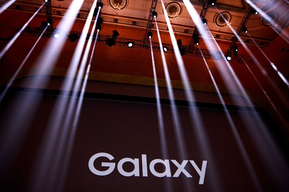 A Samsung Galaxy logo is displayed on a screen prior to the start of a launch event for the Samsung Galaxy Note 7 at the Hammerstein Ballroom, August 2, 2016 in New York City