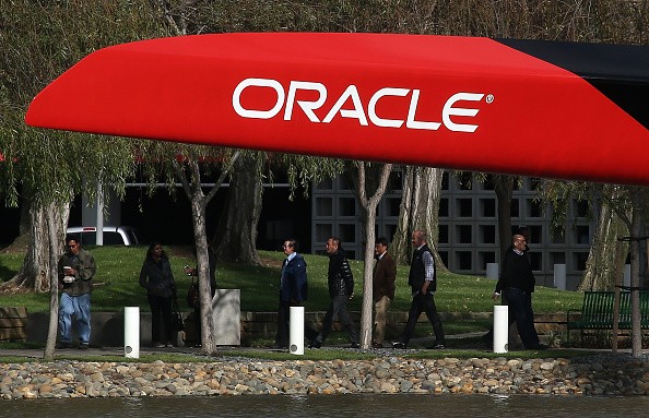 The Oracle logo is seen on an Oracle Team USA racing catamaran that is displayed in the lagoon outside of the Oracle headquarters on December 16, 2014 in Redwood City, California.