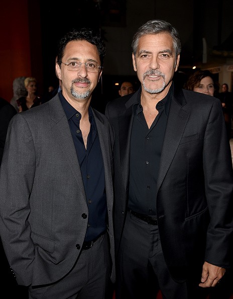 Producers Grant Heslov and George Clooney attended the premiere of Warner Bros. Pictures' “Our Brand Is Crisis” at TCL Chinese Theatre on Oct. 26, 2015 in Hollywood, California. 