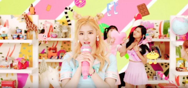 TWICE members in the official music video of "CHEER UP."