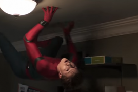 Tom Holland as Peter Parker crawls on the ceiling in a scene from 