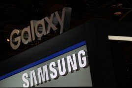 A Samsung and a Galaxy signs are seen at the Samsung booth during CES 2017 at the Las Vegas Convention Center on January 5, 2017 in Las Vegas, Nevada. 