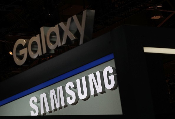 A Samsung and a Galaxy signs are seen at the Samsung booth during CES 2017 at the Las Vegas Convention Center on January 5, 2017 in Las Vegas, Nevada. 