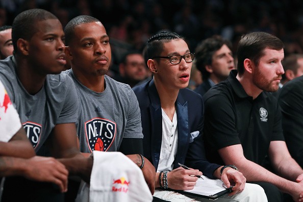 Isaiah Whitehead #15, Randy Foye #2, and Jeremy Lin #7 of the Brooklyn Nets look on from the bench against the Charlotte Hornets during the second half at Barclays Center on November 4, 2016 in New York City.