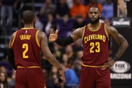 Cleveland Cavaliers players Kyrie Irving (L) and LeBron James