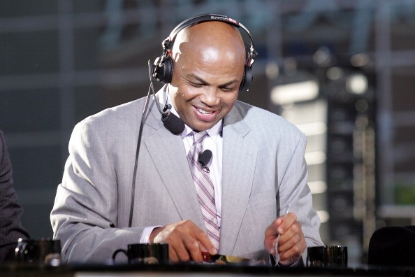 NBA analyst Charles Barkley of TNT cuts up a steak while on the set in Thunder Alley before the San Antonio Spurs take on the Oklahoma City Thunder in Game Three of the Western Conference Finals of the 2012 NBA Playoffs.