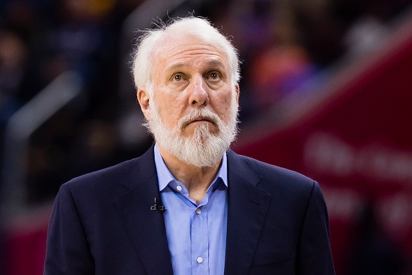Head coach Gregg Popovich of the San Antonio Spurs watches from the sidelines during overtime against the Cleveland Cavaliersat Quicken Loans Arena on January 21, 2017 in Cleveland, Ohio. 