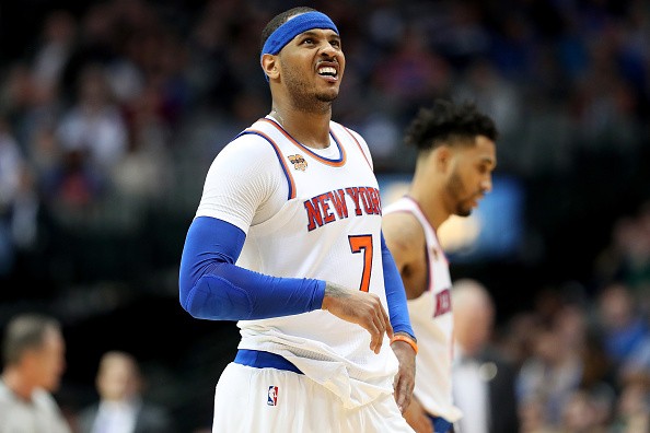 Carmelo Anthony #7 of the New York Knicks reacts against the Dallas Mavericks in the second half at American Airlines Center on January 25, 2017 in Dallas, Texas. 