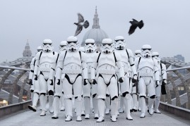 People dressed as Stormtroopers from the Star Wars franchise of films posed on the Millennium Bridge to promote the latest release in the series, “Rogue One,” on Dec. 15, 2016 in London, England. 