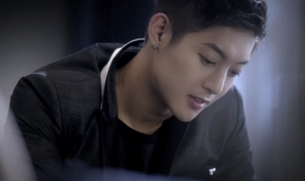 Korean singer-actor Kim Hyun Joong in the official music video of "Please."