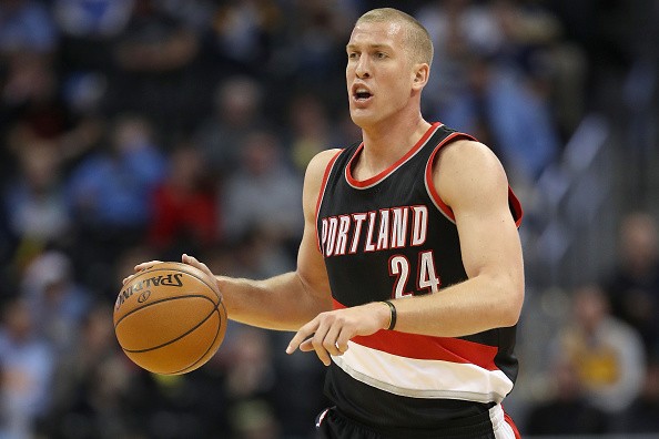 Mason Plumlee #24 of the Portland Trail Blazers brings the ball down court against the Denver Nuggets at the Pepsi Center on December 15, 2016 in Denver, Colorado.