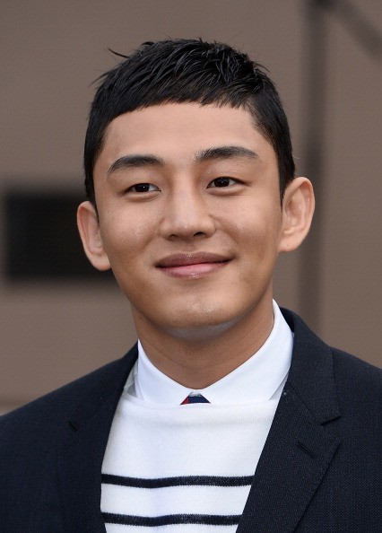 Korean actor Yoo Ah In in attendance during the Burberry AW14 Menswear Show in London.