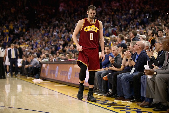 Kevin Love is grimacing as he walks off the court during their game against the Golden State Warriors at ORACLE Arena on January 16, 2017 in Oakland, California. 