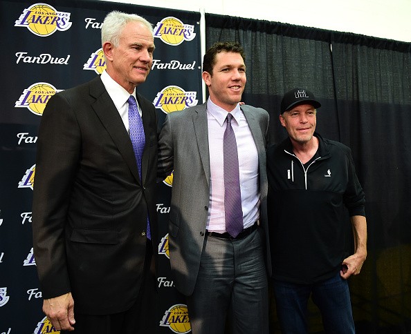 Luke Walton with Los Angeles Lakers General Manager Mitch Kupchak and part owner Jim Buss after he is introduced as the new head coach of the  Los Angeles Lakers. in June 2016