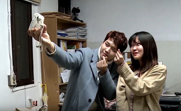 INFINITE's Woohyun makes a surprise visit to a fan for Dingo Studios' special series.