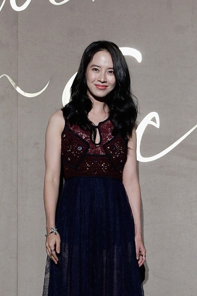 "Running Man" host Song Ji Hyo attends the store opening event of Burberry Seoul Flagship.