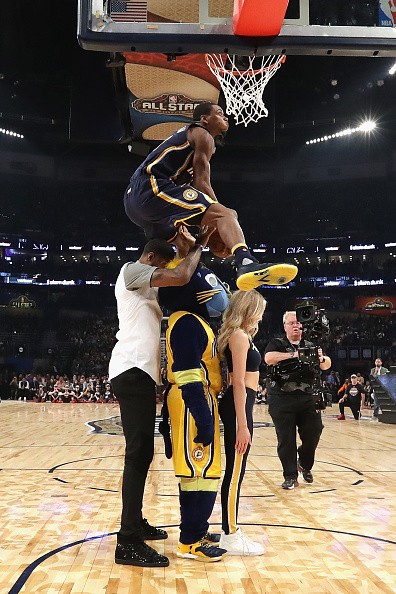 Glenn Robinson III #40 of the Indiana Pacers competes in the 2017 Verizon Slam Dunk Contest with Paul George #13 of the Indiana Pacers at Smoothie King Center on February 18, 2017 in New Orleans, Louisiana.