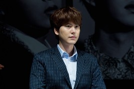 Kyuhyun of South Korean boy band Super Junior attends the press conference for SM Entertainment's Super Junior 10th Anniversary Special Album 'Devil' at SMtown Theatre on July 15, 2015 in Seoul, South Korea.