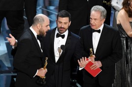 The “La La Land” producer Jordan Horowitz on the left announces that “Moonlight” is the Oscars Best Picture winner. Horowitz is with the host Jimmy Kimmel, in the middle and with the actor Warren Beatty on the right.