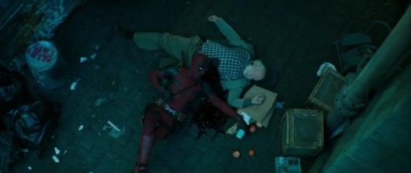 Deadpool rests on the victim's body in 'Deadpool 2' teaser