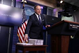 U.S. White House Press Secretary Sean Spicer compares a copy of the Obamacare bill (R) and a copy of the new House Republican Healthcare Bill (L) during the White House daily press briefing March 7, 2017 at the White House in Washington, DC.