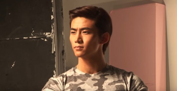 2PM's Taecyeon poses during a photo shoot for a men's health magazine.