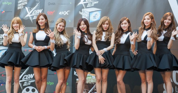 Girls' Generation members pose upon arrival at the KCON 2014.