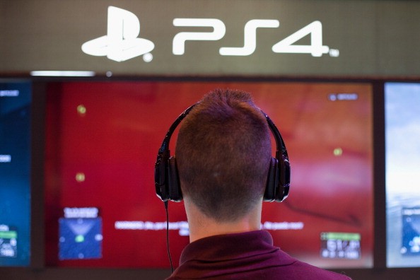  A man plays on a Playstation 4 at Madrid Games Week in IFEMA on Nov. 9, 2013 in Madrid, Spain. 