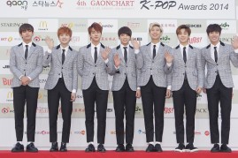 BTS members pose upon their arrival at the 4th Gaon Chart K-POP Awards.