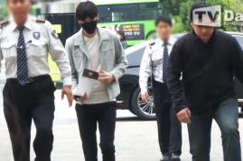 Lee Min Ho arrives at the Gangnam government office in Seoul for the first day of his military service.