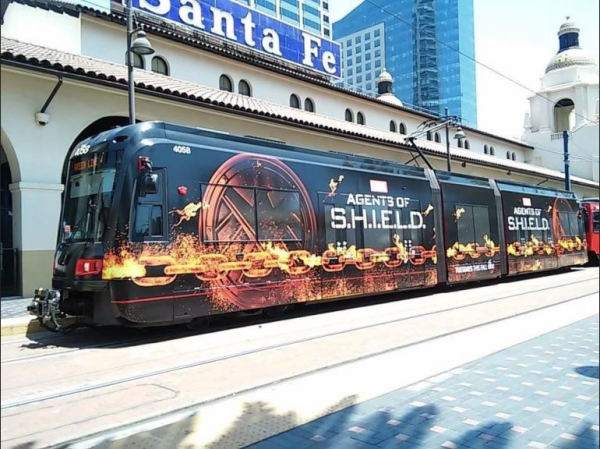 Agents of S.H.I.E.L.D. teaser image showing the burning logo and chain in a tram.