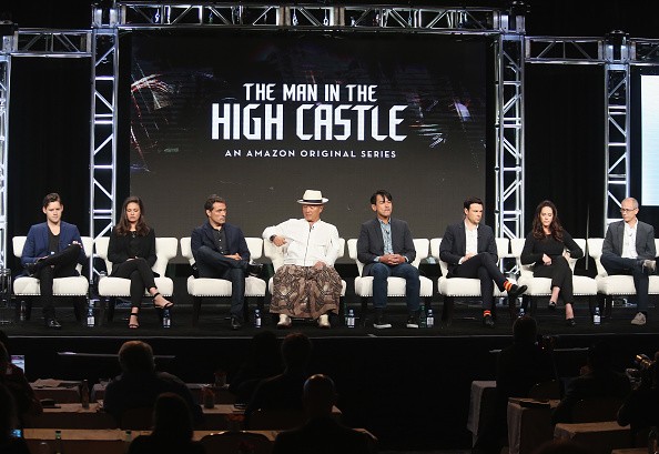 Actors Luke Kleintank, Alexa Davalos, Rufus Sewell, Cary-Hiroyuki Tagawa, Joel de la Fuente, Rupert Evans, executive producer Isa Hackett and executive producer David Zucker speak onstage at 'The Man in the High Castle' panel discussion during the Amazon 