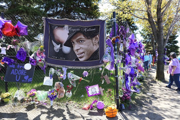 Tributes and memorials dedicated to Prince on the fence that surrounds Paisley Park on May 2, 2016 in Chaska, Minnesota. Prince died on April 21, 2016 at his Paisley Park compound at the age of 57. 