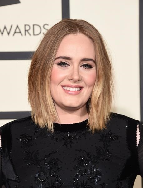 Singer Adele smiled and attended The 58th GRAMMY Awards at Staples Center on Feb. 15 in Los Angeles, California.