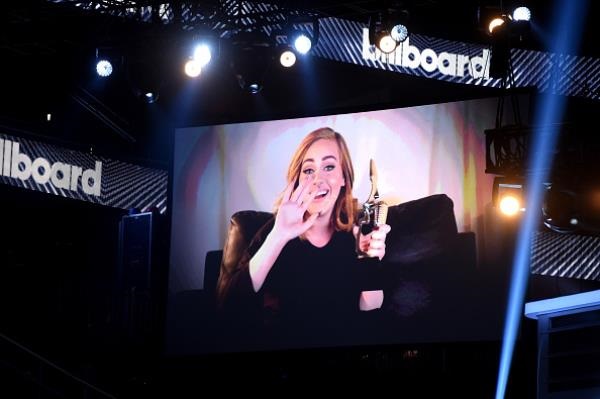 Recording artist Adele accepted her award the Top Billboard 200 Album for "25" onscreen during the 2016 Billboard Music Awards at T-Mobile Arena on May 22 in Las Vegas, Nevada.