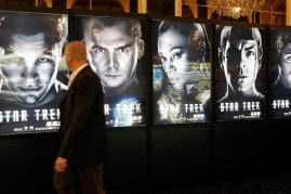  An attendee walks by movie posters for the new Star Trek film at the Paris Las Vegas during ShoWest, the official convention of the National Association of Theatre Owners, March 30, 2009 in Las Vegas, Nevada. 