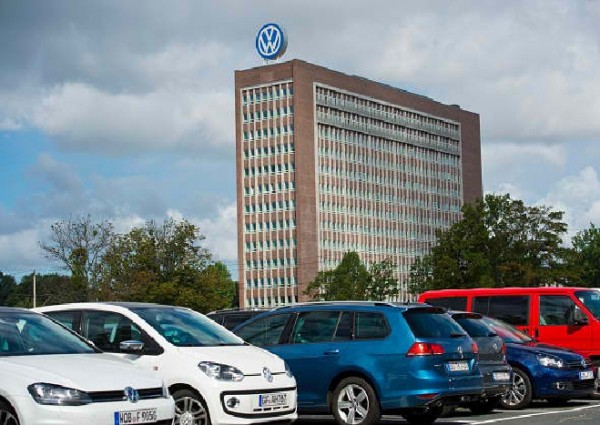 Office Builiding of Volkswagen AG headquarters seen behind VW employees car park on August 09, 2016 in Wolfsburg, Germany.