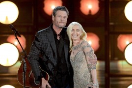 Blake Shelton surprised Gwen Stefani and her fans by joining her on stage at Dallas. 
