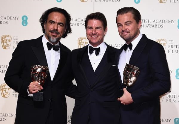 Alejandro G. Iñárritu, winner of Best Director for 'The Revenant', Tom Cruise and Leonardo Dicaprio, winner of Best Actor for 'The Revenant' pose in the winners room at the EE British Academy Film Awards at the Royal Opera House on February 14 in London, 