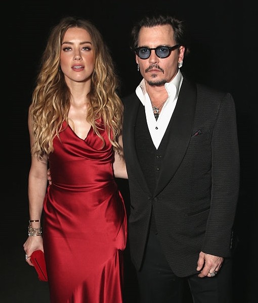 Amber Heard and Johnny Depp attend The Art of Elysium 2016 HEAVEN Gala presented by Vivienne Westwood & Andreas Kronthaler.