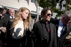 Model, Amber Heard, and her husband, Johnny Depp, leave Southport Magistrates Court, Queensland, April 18, 2016.