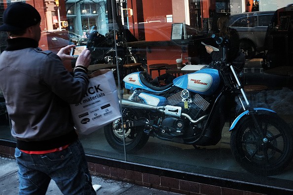 A Harley Davidson motorcycle sits in a window of the Milwaukee-based motorcycle company's New York Store on January 28, 2016 in New York City. 