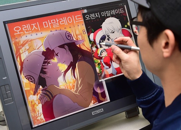 Webtoon artist Seok-Woo working at his office in Bucheon, west of Seoul.