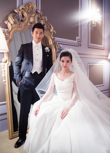 Chinese celebrity couple Angelababy and Huang Xiaoming during their wedding day.