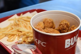Some chips and chicken fried of a KFC restaurant in Milan are displayed during the opening of a new Kentucky Fried Chicken branch on July 28, 2016 in Milan, Italy. KFC Milan seats 160 with 30 staff and will be open 7 days a week from 12 PM to 24 AM
