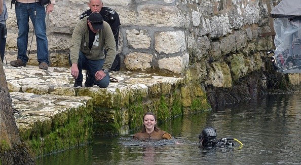Maisie Williams, who plays Ayra Stark on Game of Thrones, is filmed during a water scene for the new series on August 17, 2015 in Carnlough, Northern Ireland. 